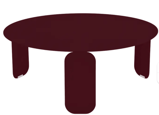 Fermob Bebop low outdoor table with black cherry finish, round shape, 80cm diameter, suitable for garden or patio use.