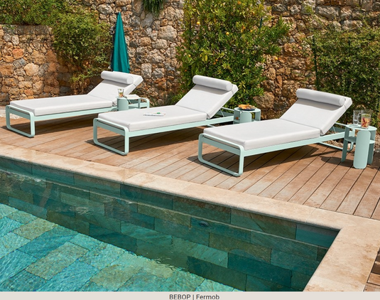 Fermob Bebop Side Table with 35cm diameter in anthracite metal, outdoor offset table with sleek, modern design.