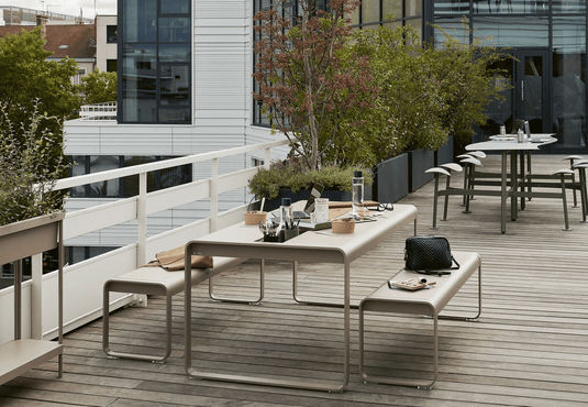 Fermob Bellevie outdoor dining table in wood and metal, 196x90 cm with storage, eight-seater for patio or garden.