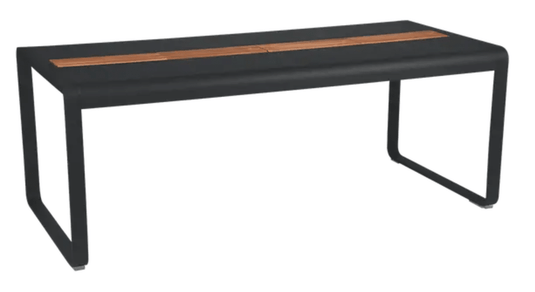 Fermob Bellevie outdoor dining table in wood and metal, 196x90cm, with storage, designed for eight seaters, in an anthracite finish.
