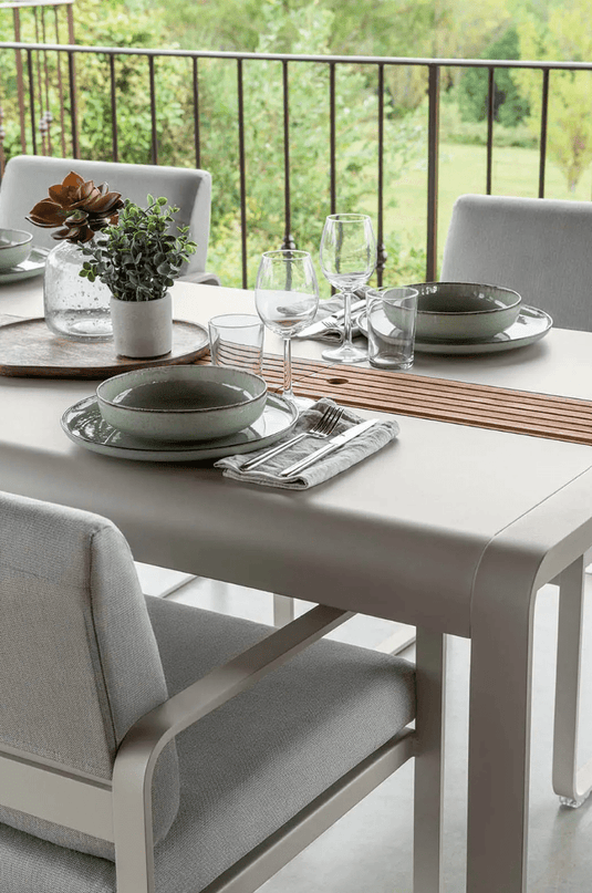 Fermob Bellevie outdoor dining table in wood and metal, 196x90 cm, with storage, designed for eight-seat outdoor dining.