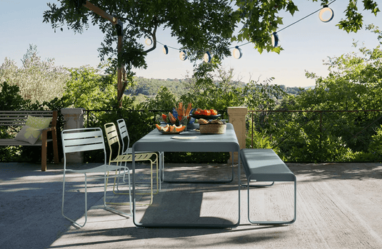 Fermob Bellevie outdoor metal dining table, 196 x 90 cm, eight-seater, with a sleek design and sturdy construction for outdoor use.
