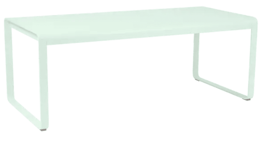 Fermob Bellevie outdoor metal dining table, 196x90 cm, eight-seater with a sleek mint finish, suitable for outdoor dining spaces.