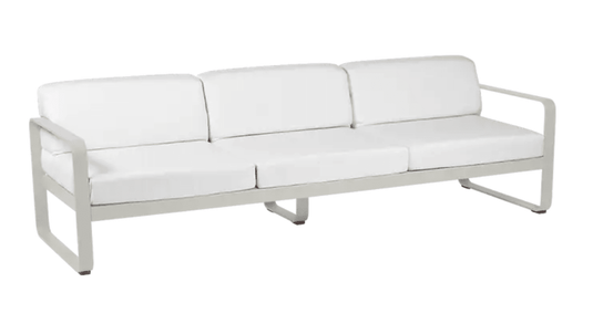 Bellevie 3-seater outdoor sofa by Fermob with metal frame in clay grey and off-white fabric, suitable for outdoor contract furniture.