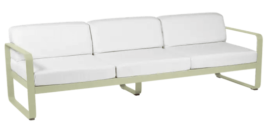 Willow green and off-white Fermob Bellevie 3-seater outdoor sofa with metal frame and fabric cushions, suitable for garden seating.