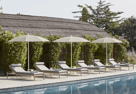 Fermob Bellevie Premium Sunlounger with sleek design and adjustable backrest, ideal for outdoor relaxation and lounging.
