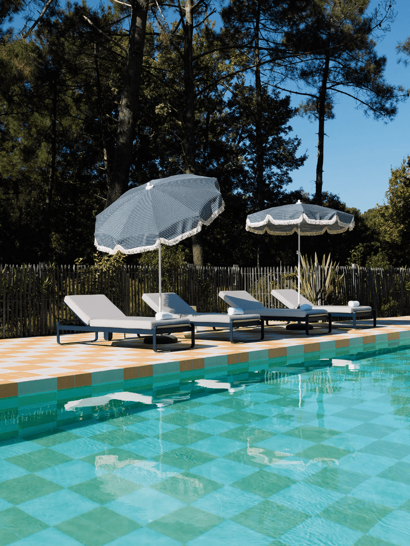 Load image into Gallery viewer, Fermob Bellevie Premium Sunlounger with adjustable backrest and cushioned seat in outdoor garden setting.
