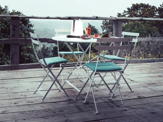 Bistro Table Ø117cm six seater - Custom Wood DesignsFermob round bistro table with 117cm diameter and umbrella hole, suitable for six seats in restaurant or hotel settings.Round Table Fermob7913.0Willow Green