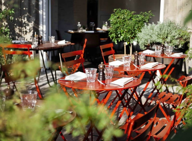 Load image into Gallery viewer, Bistro Table Ø117cm six seater - Custom Wood DesignsRound Fermob Bistro Table with 117cm diameter and umbrella hole, suitable for six seats, ideal for restaurant or hotel settings.Round Table Fermob7913.0Willow Green
