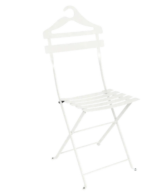 Fermob Bistro Valet folding metal chair hanging in a stylish outdoor setting, showcasing its foldable design and modern metal construction.