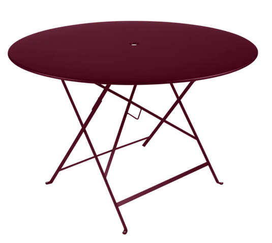 Black cherry Fermob round bistro table, Ø117cm, outdoor metal dining table, six-seater for patio or garden use.