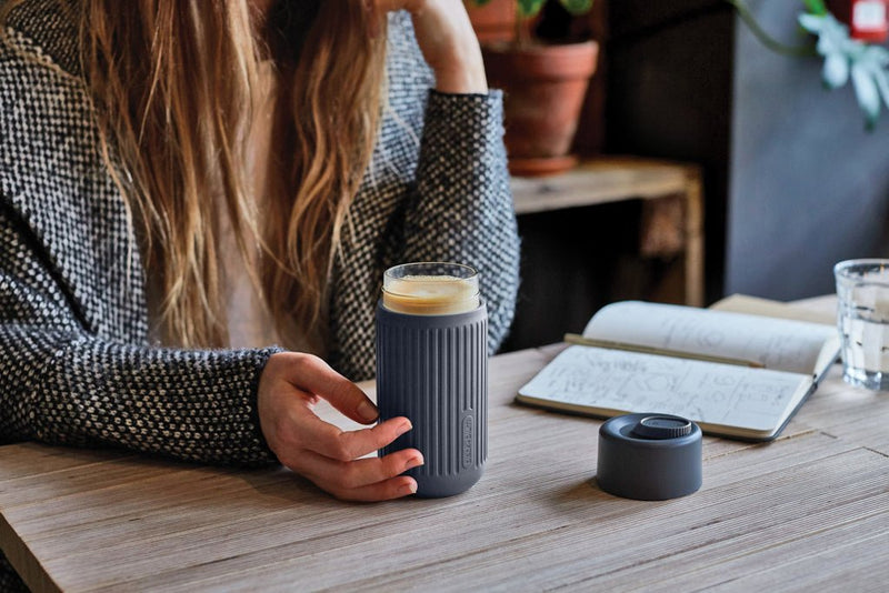 Load image into Gallery viewer, Black+Blum Glass Travel Cup 340ML - Custom Wood DesignsBlack + Blum glass travel cup, 340ml drinkware with black lid, shown with a sleek, modern design for on-the-go beverages.DrinkwareP439.1602Glass,Siliconegrey

