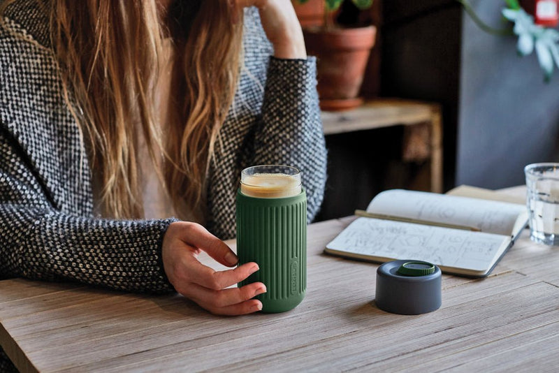 Load image into Gallery viewer, Black+Blum Glass Travel Cup 340ML - Custom Wood DesignsBlack+Blum glass travel cup with black lid, 340ml capacity, designed for hot and cold beverages, sleek and portable drinkware.DrinkwareP439.1627Glass,Siliconeolive green
