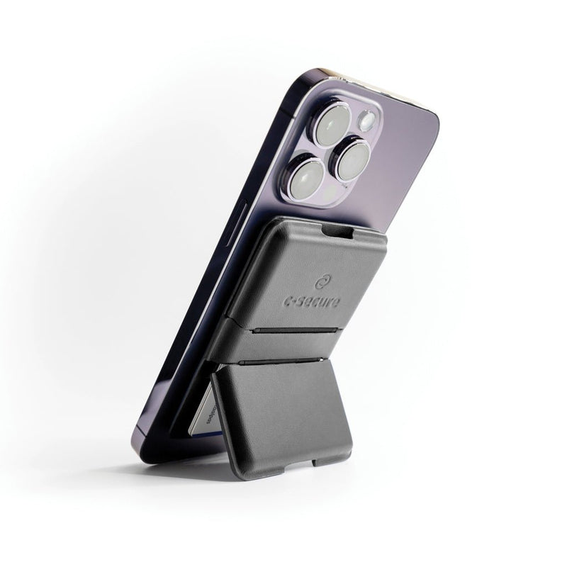 Load image into Gallery viewer, C-Secure Mag Safe phone wallet - Custom Wood DesignsC-Secure Mag Safe phone wallet attached to a smartphone, holding cards and cash, designed for secure mobile access and convenience.Phone &amp; Tablet accessoriesP820.9901Polyurethaneblack
