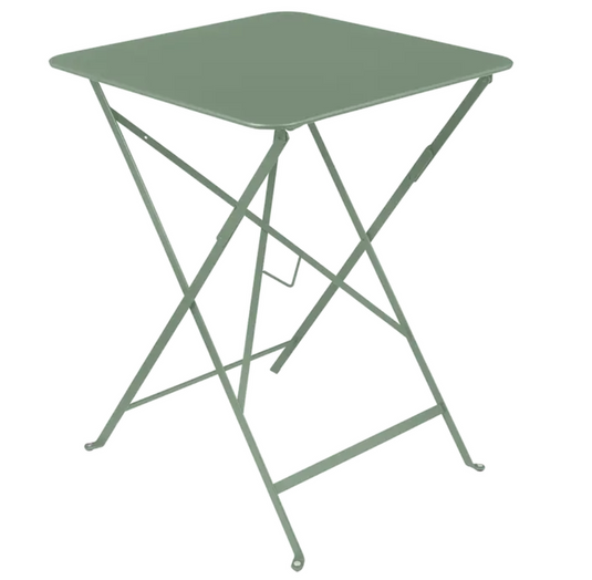 Cactus green Fermob metal foldable bistro table measuring 57x57 inches, suitable for outdoor patio or cafe setting.