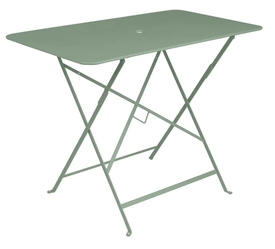 Fermob metal foldable bistro table with cactus and Parisian style design, rectangular shape, 97x57 cm, suitable for outdoor dining.