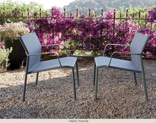 Fermob Cadiz Low Armchair outdoor aluminum chair with technical fabric seat, modern design for patio or garden use.