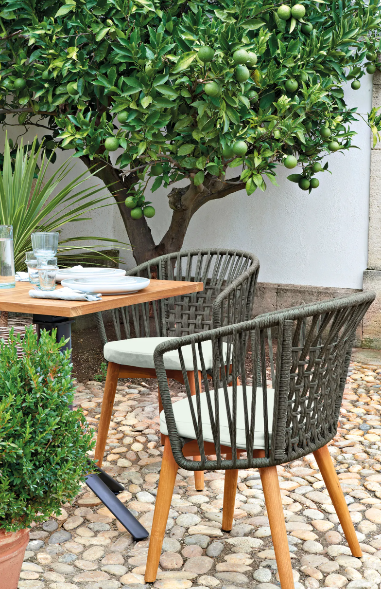 Load image into Gallery viewer, Fermob GORDES luxury teak outdoor chair with cushioned seating, perfect for stylish patio or cafe outdoor spaces.
