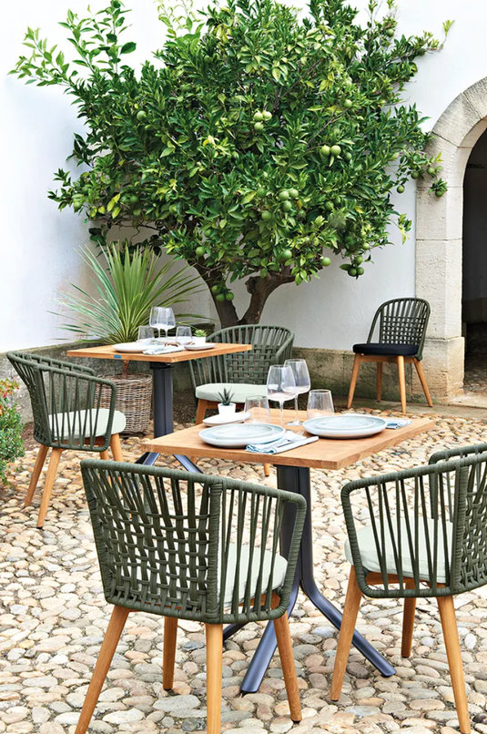 Fermob GORDES luxury teak outdoor chair with cushioned seating, ideal for stylish garden or patio outdoor spaces.