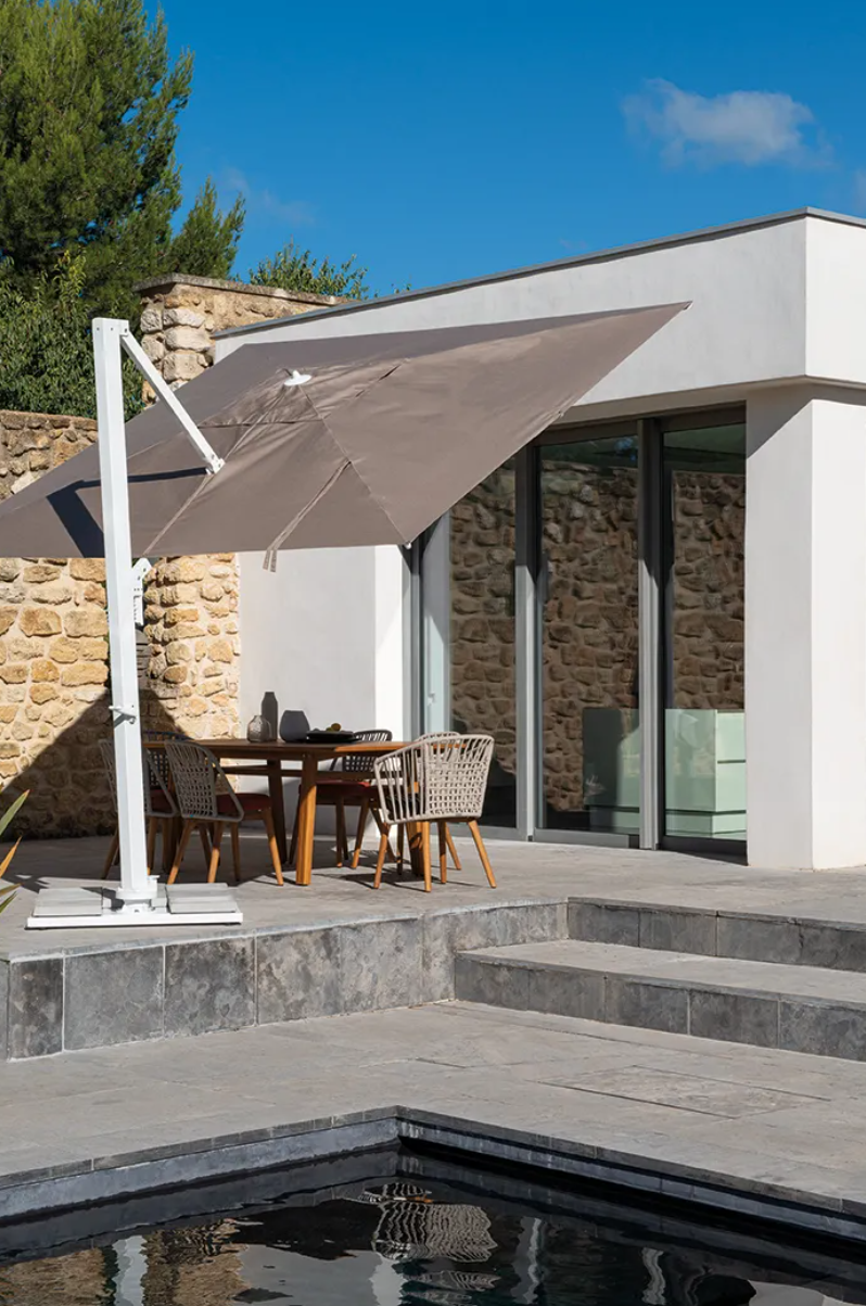 Load image into Gallery viewer, Fermob GORDES luxury teak outdoor chair with cushioned seating, ideal for cafe or patio outdoor spaces.
