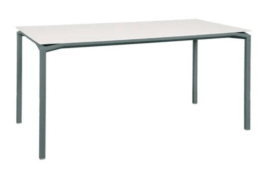Storm grey Fermob Calvi Aeris mineral dining table, 160x80 cm, six-seater with sleek modern design for outdoor or indoor use.