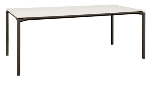 Fermob Calvi Aeris mineral dining table with eight seats, 195 x 95 cm, featuring a stylish tabletop and sturdy legs.