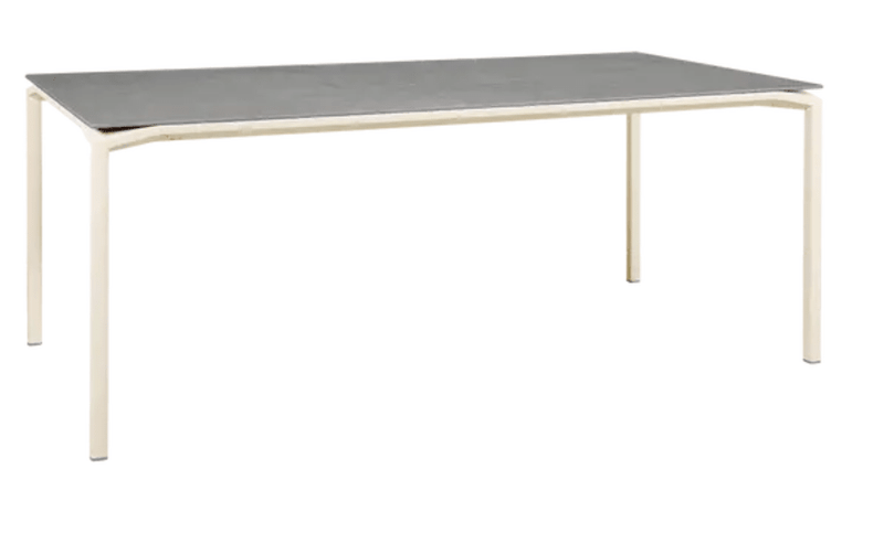Load image into Gallery viewer, Fermob CALVI Kreta mineral dining table, 195x95 cm, eight-seater with latte-colored tabletop and sturdy metal legs.
