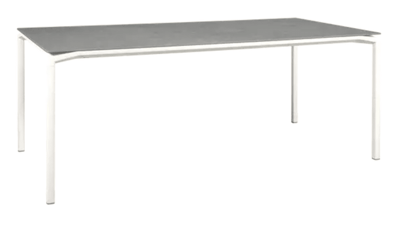 Load image into Gallery viewer, White Fermob CALVI Kreta mineral dining table, 195 x 95 cm, eight seater with sleek tabletop and sturdy legs.
