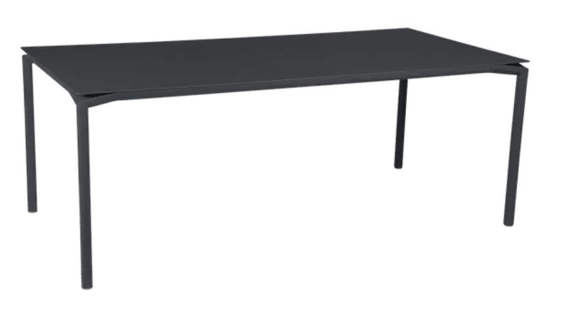 Load image into Gallery viewer, Fermob Calvi rectangular outdoor dining table, 195x95 cm, in anthracite, suitable for outdoor and indoor use.
