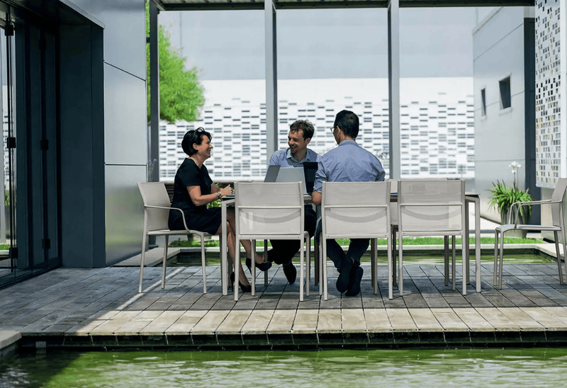 Load image into Gallery viewer, Fermob Calvi outdoor rectangular dining table, 195x95 cm, with eight seats, suitable for outdoor and indoor use.
