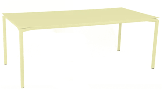 Fermob Calvi rectangular outdoor dining table, 195 x 95 cm, eight seater with frosted lemon finish, suitable for outdoor and indoor use.