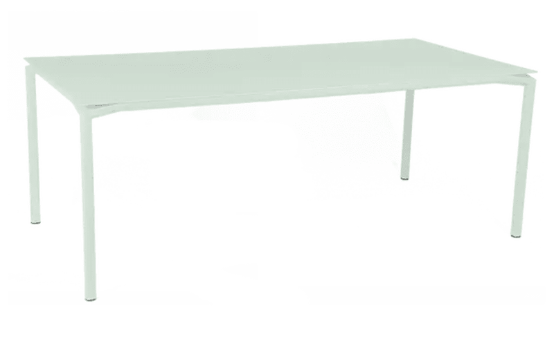 Load image into Gallery viewer, Fermob Calvi outdoor rectangular dining table in ice mint, 195 x 95 cm, suitable for eight seats, featuring modern design.
