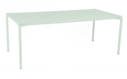 Fermob Calvi outdoor rectangular dining table in ice mint, 195 x 95 cm, suitable for eight seats, featuring modern design.