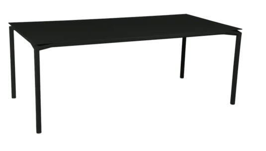 Fermob Calvi rectangular outdoor dining table, 195 x 95 cm, eight-seater with liquorice finish, suitable for outdoor and indoor use.
