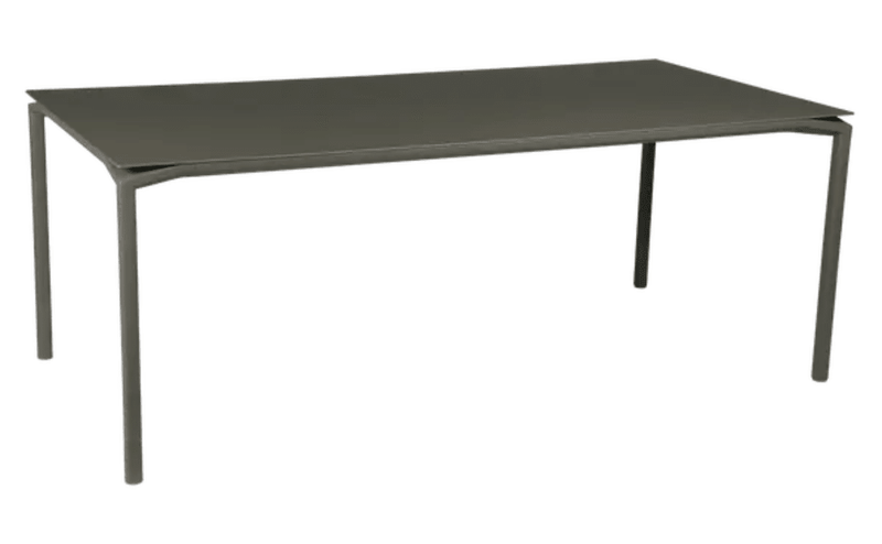 Load image into Gallery viewer, Rectangular Fermob Calvi outdoor dining table, 195x95 cm, eight-seater, featuring a sleek design for indoor or outdoor use.

