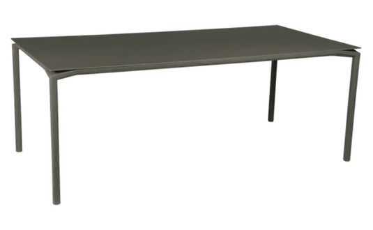 Rectangular Fermob Calvi outdoor dining table, 195x95 cm, eight-seater, featuring a sleek design for indoor or outdoor use.