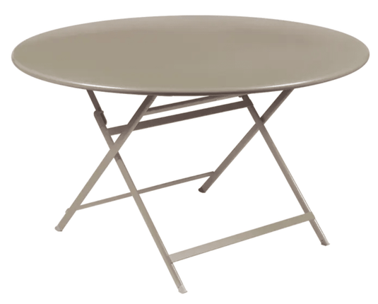 Fermob Caractère foldable metal table with 128 cm diameter, nutmeg color, set for eight seats, and compact in a folded position.