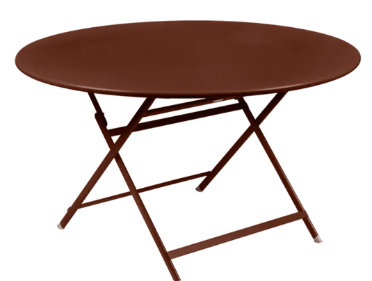 Red Ochre Fermob Caractère 128cm foldable metal table, eight-seater, with a smooth round surface and foldable design.