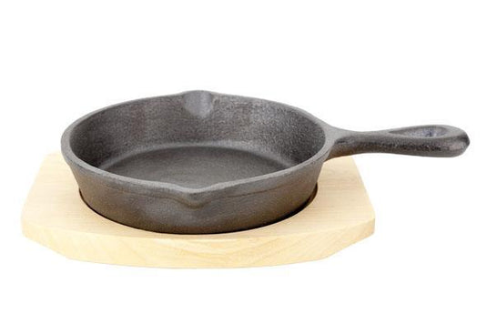 Cast iron pan with a wooden base, 135mm - Custom Wood DesignsFine Dine cast iron frying pan with wooden base, 135mm diameter, durable cookware for versatile stovetop use.cast iron frying pan1495207
