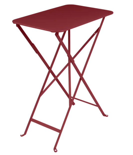 Fermob Bistro folding table in chilli red with rectangular steel design, perfect for outdoor use and easy to store.