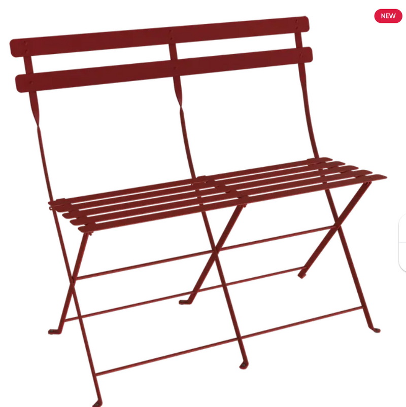 Load image into Gallery viewer, Fermob Bistro Two Seater Ottoman folding bench in vibrant chili red, designed for outdoor or patio seating.
