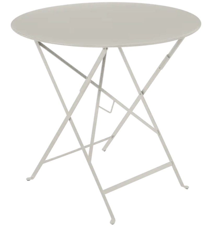 Load image into Gallery viewer, Clay grey Fermob round outdoor bistro table, Ø77cm, folding metal design, perfect for four-seat cafe or patio setup.
