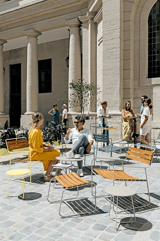 Small Fermob Cocotte occasional table with a Ø34cm round top and sleek design, perfect as a versatile accent table.