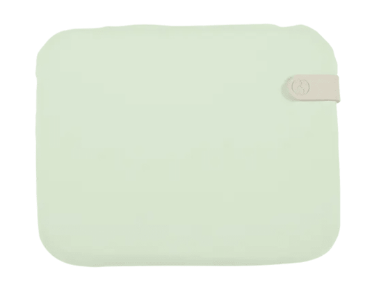 Mint-colored Fermob outdoor bistro cushion, 38x30 cm, designed for Fermob foldable chairs, with a vibrant color mix pattern.