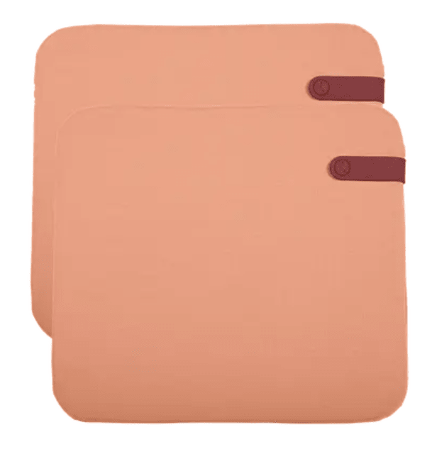 Load image into Gallery viewer, Set of 2 Fermob outdoor cushions in apricot color, 41 x 45 cm, featuring vibrant fabric for patio seating.
