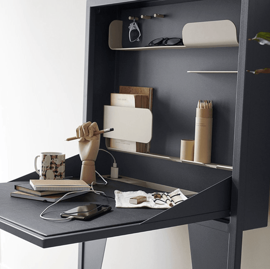 Wall-mounted Fermob Face à Face writing desk in honey finish, featuring a sleek, modern design with a fold-down writing surface.