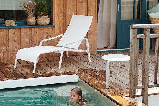 Fermob Alizé outdoor furniture in a garden setting