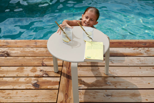 Fermob Alizé outdoor furniture in a garden setting
