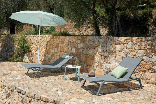 Fermob Alizé outdoor furniture in a garden setting
