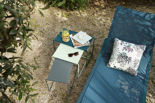 Fermob Alizé outdoor furniture in a garden setting